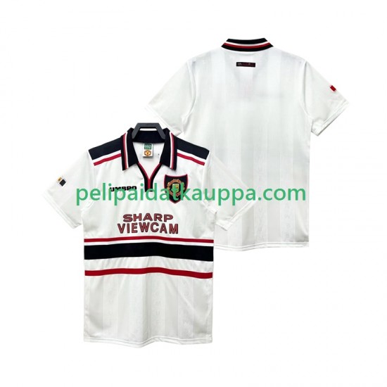 Manchester United Retro Vieras Fanipelipaita (Miehet) 1998 1999 Lyhythihainen Manchester United Retro Vieras Fanipelipaita (Miehet) 1998 1999 Lyhythihainen